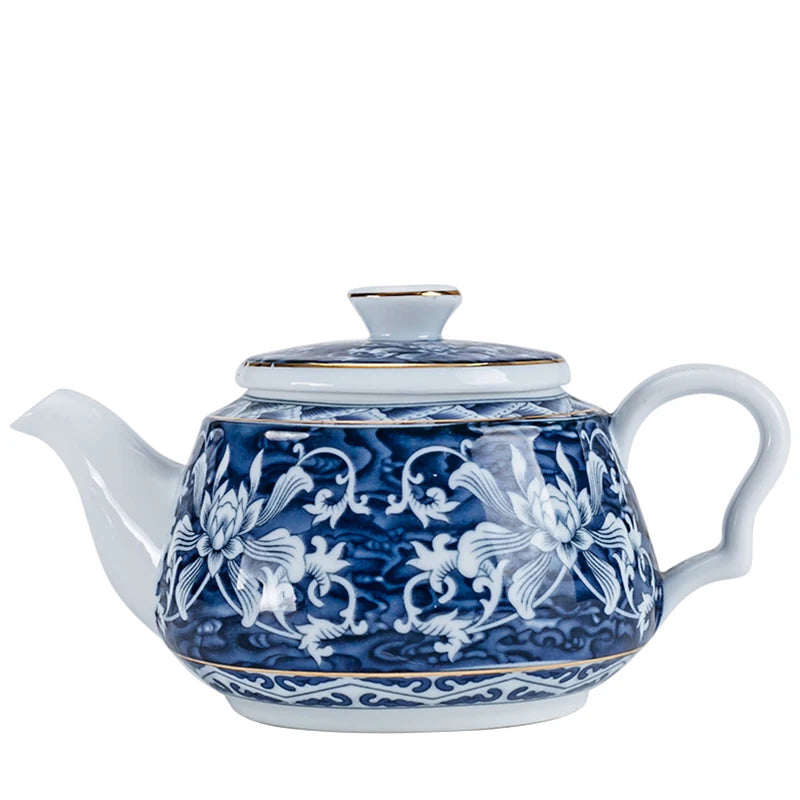 Théière Anastasia en porcelaine émaillée bleue à motifs floraux blancs