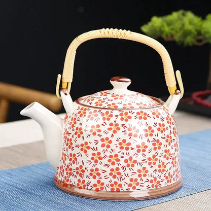 Théière Calliope, motif fleurs rouges et oranges