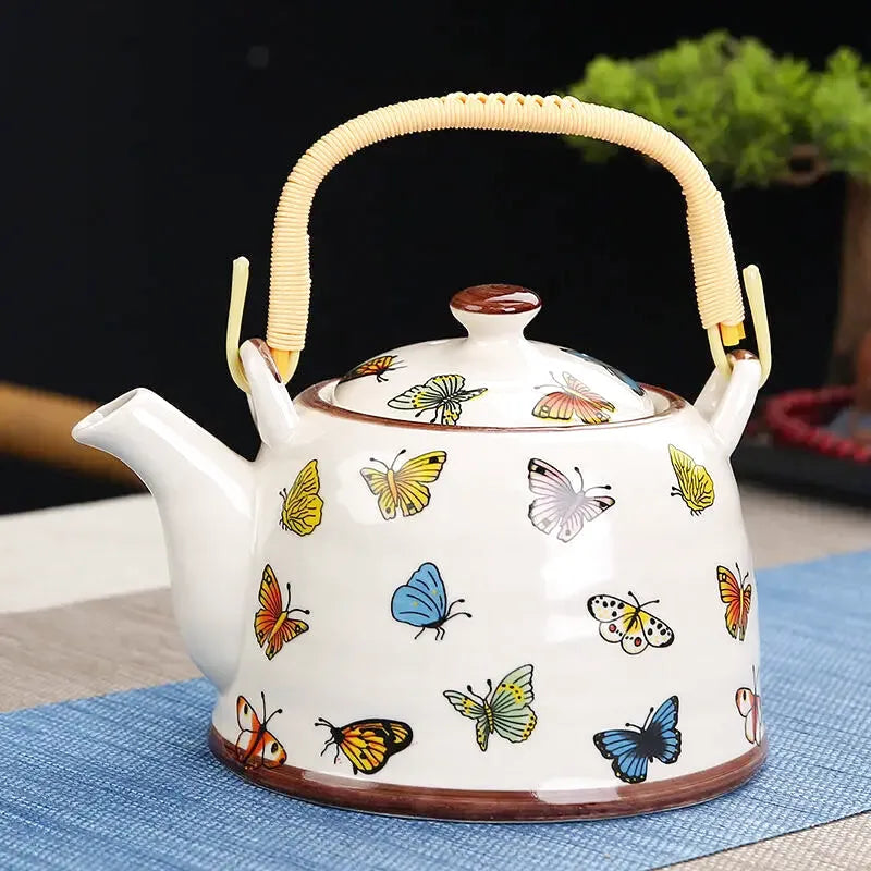 Théière Calliope, motif papillons colorés